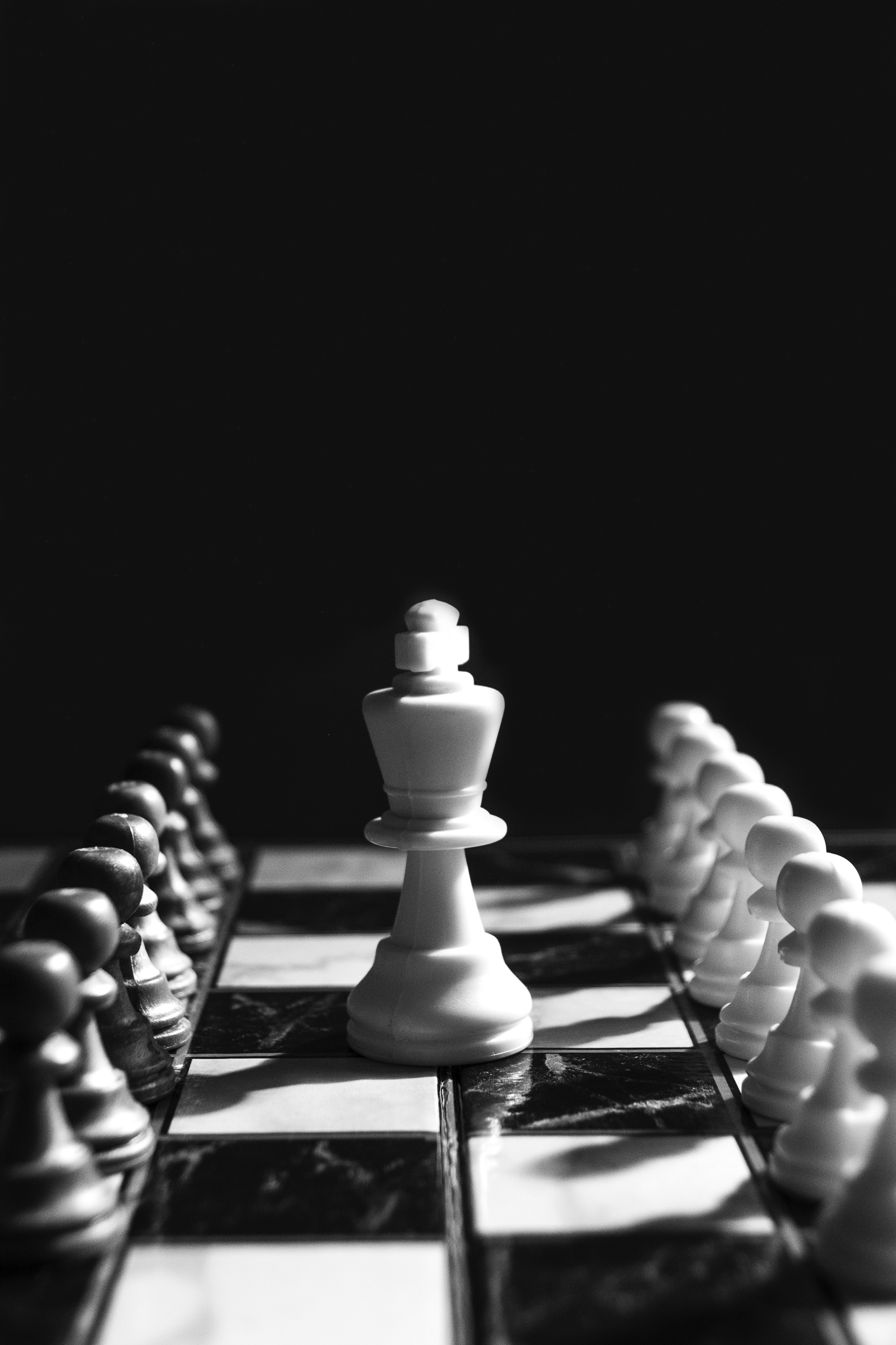 King figure in on a chess board while two lines of pawns on right and left.
5 Proven Ways to Lead with Charisma and Make Influence on Others